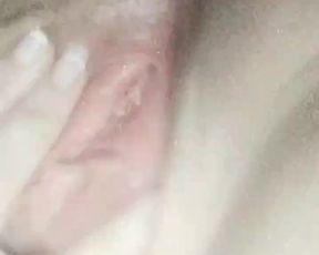 Fingering a pink pussy