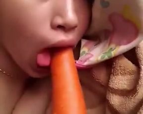 Asian masturbate with carrot